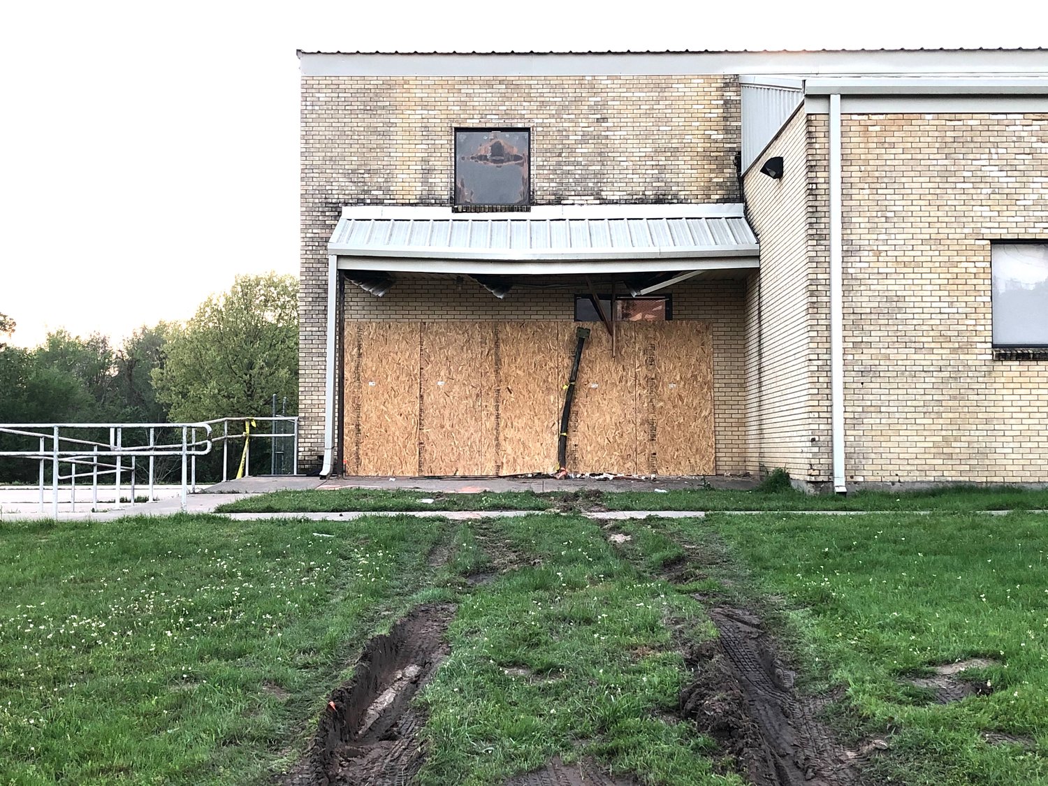 The gym at the Addie McFarland School in Mineola was boarded up last week after a man ran into it with his vehicle, apparently after a medical emergency.